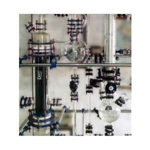 Glass shell and tube heat exchanger installation – laboratory or pilot plant setup with columns, vessels and tubing